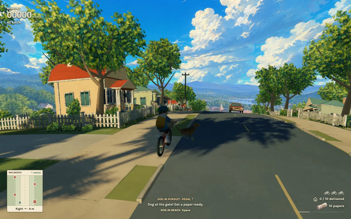 A dog gives chase down the road while the rider pedals away.
